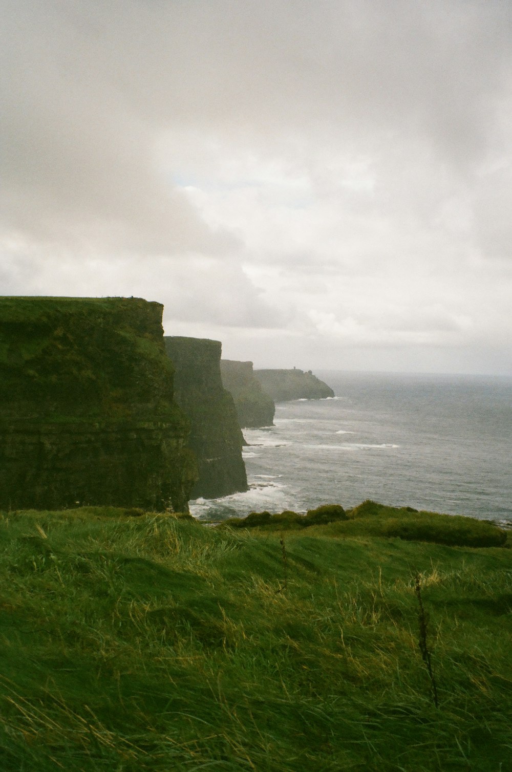 a view of the ocean from a cliff