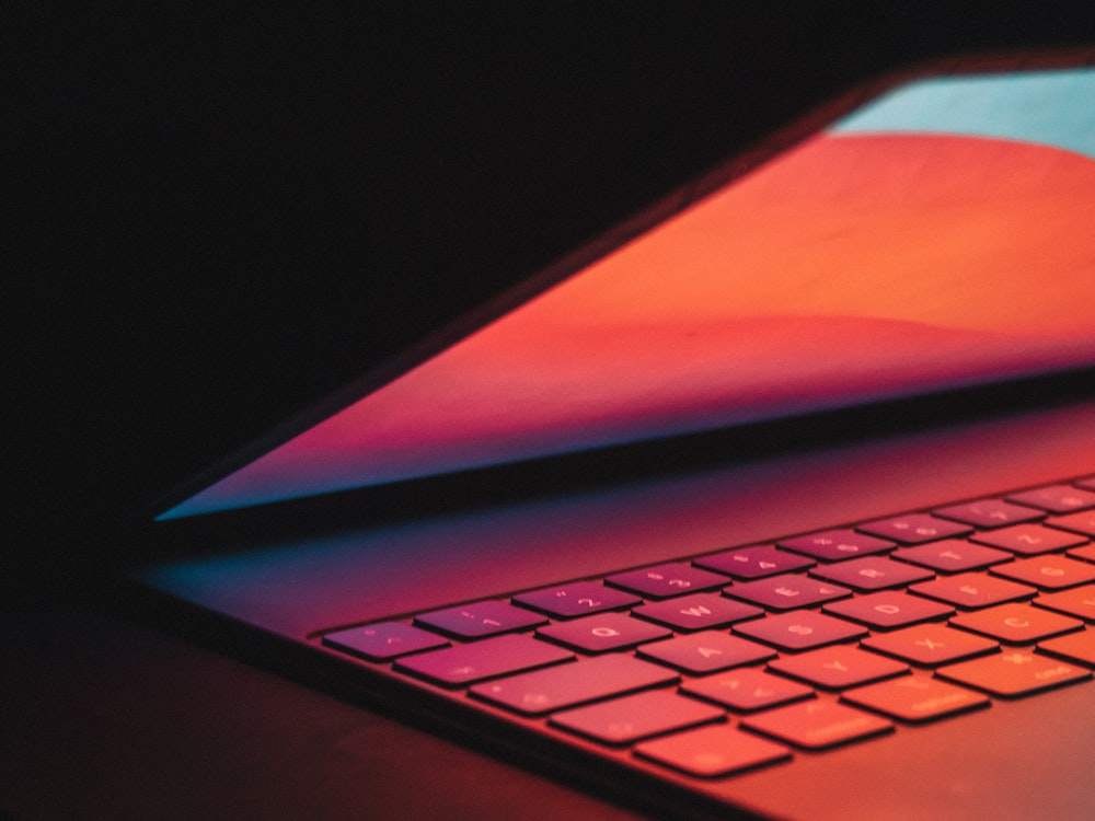 a close up of a laptop computer keyboard