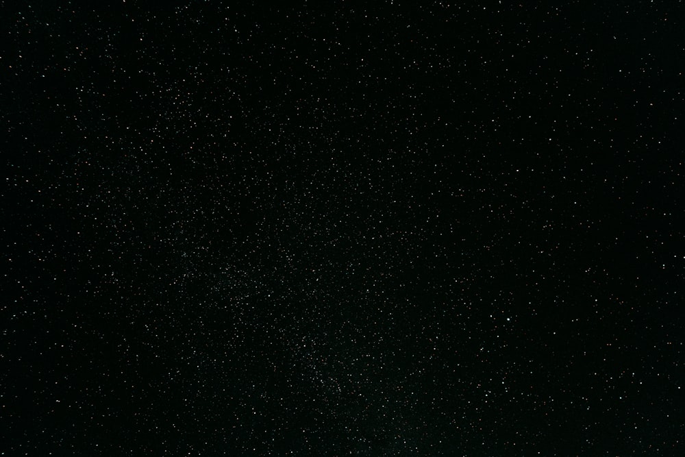 a black sky with a lot of stars