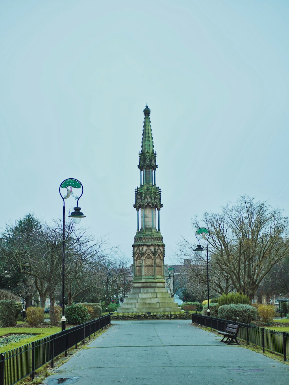 a statue in the middle of a park