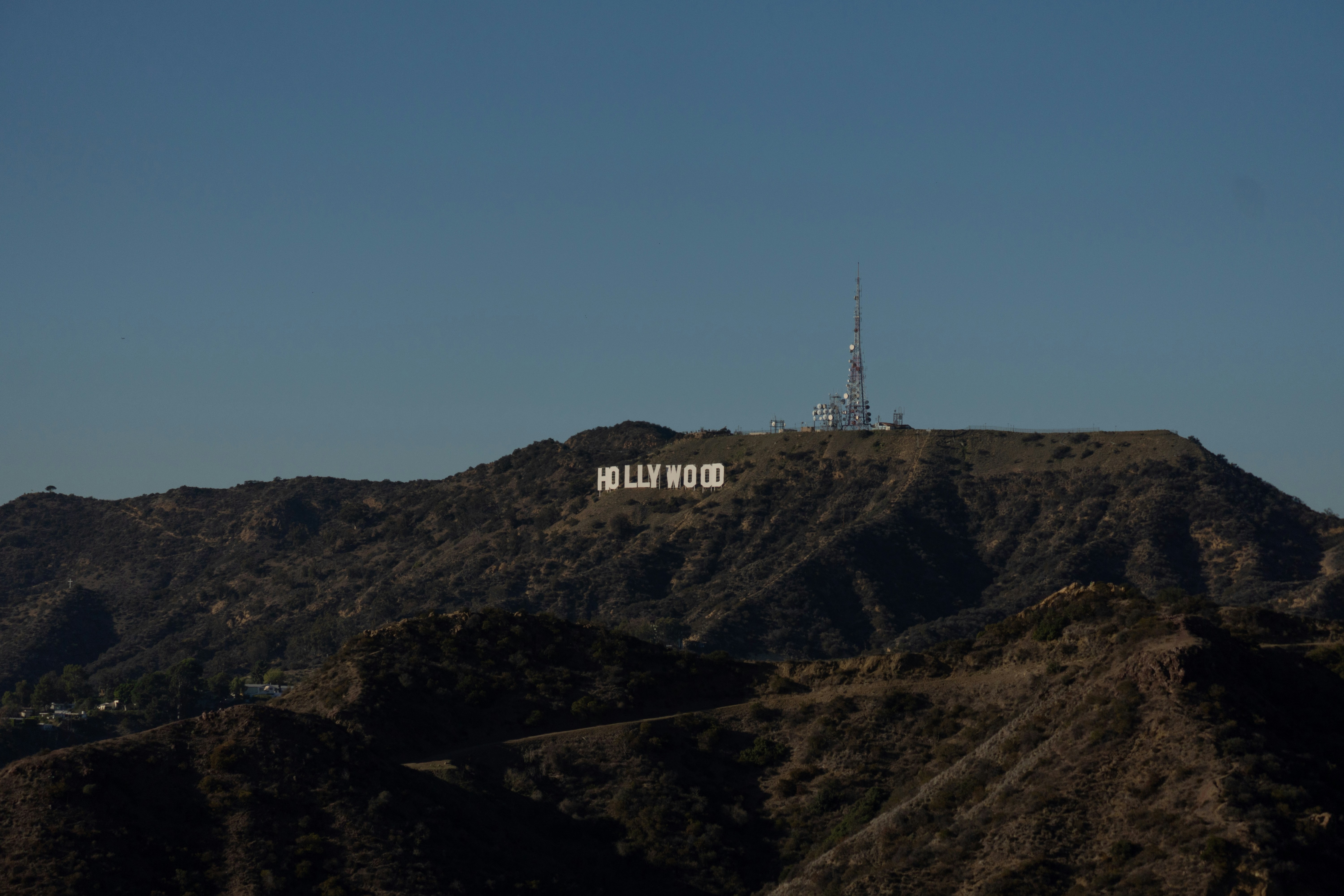 a hill with a sign on top of it