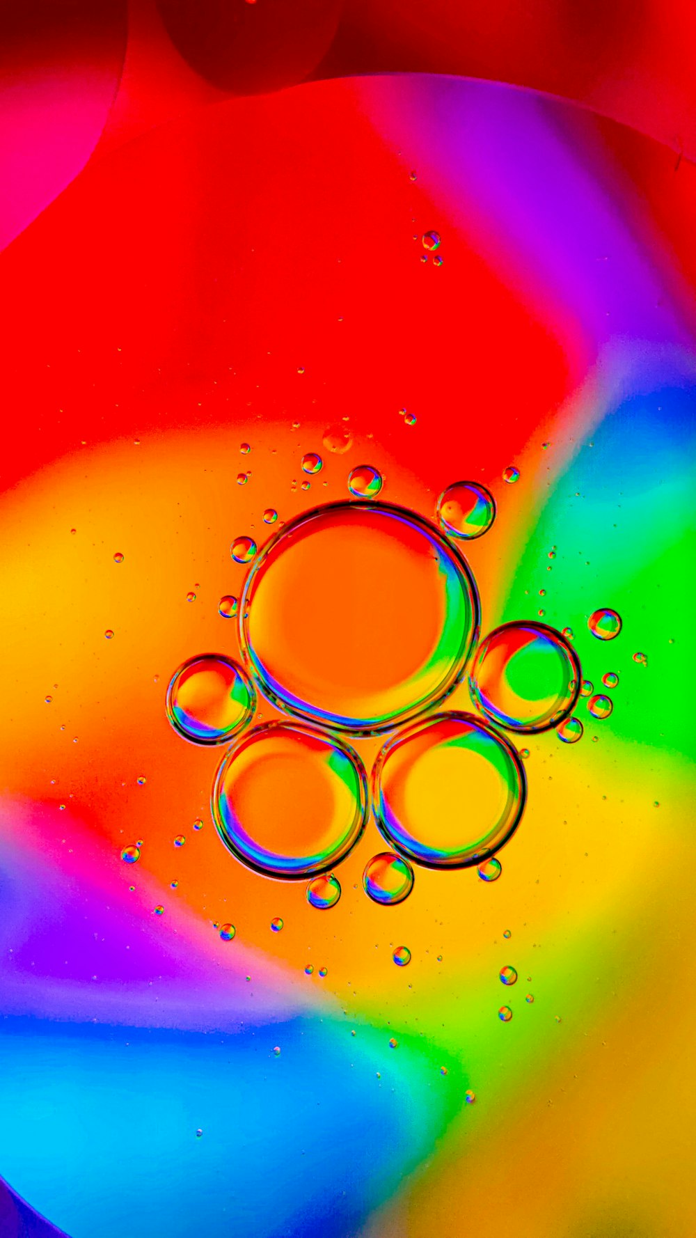 a multicolored background with bubbles of water