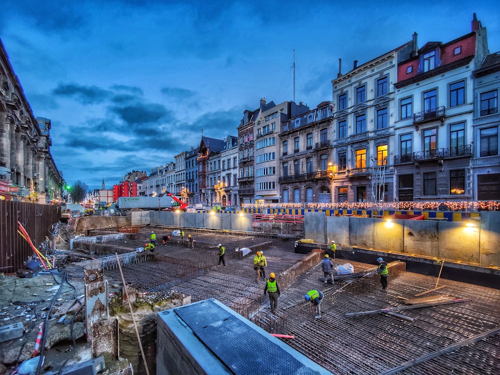 a group of people working on a construction site