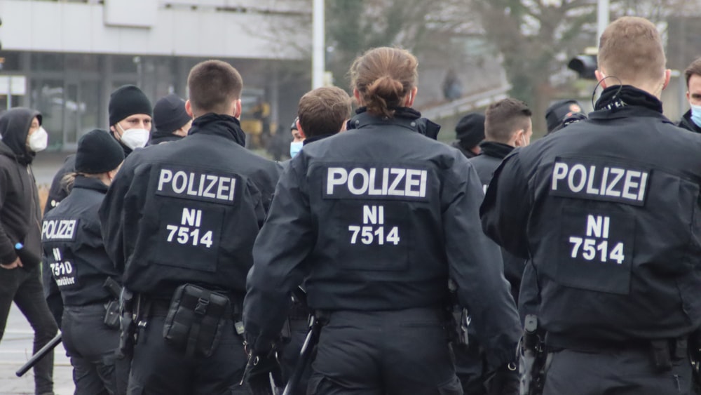 a group of police officers standing next to each other