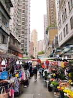 A bustling street market filled with colorful stalls and friendly vendors.