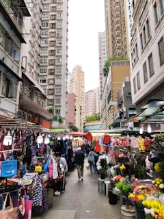 A bustling market street filled with colorful stalls