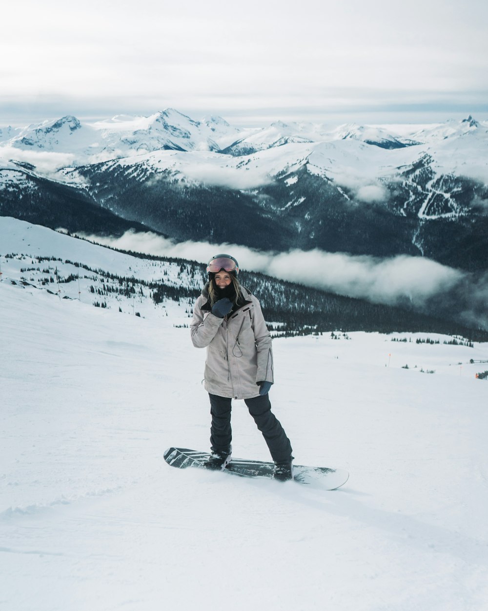 A person standing on a snowboard in the snow photo – Free Bc Image on  Unsplash