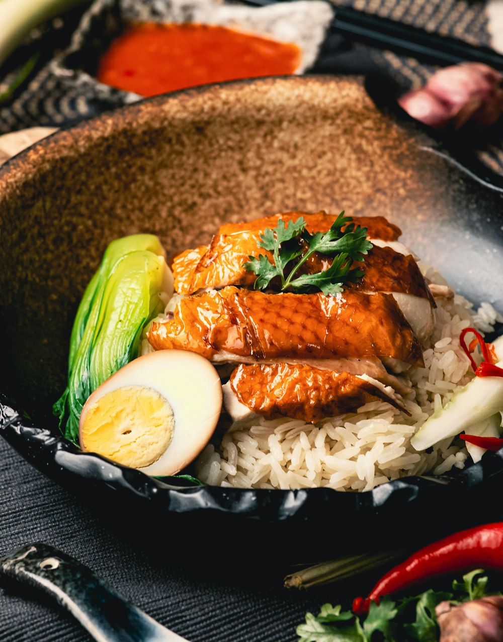 a close up of a bowl of food on a table