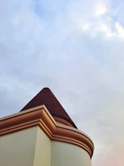 a building with a clock on the top of it