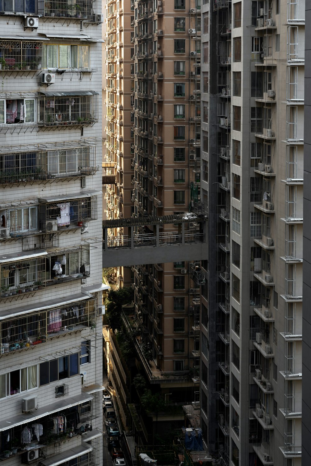 a group of tall buildings with balconies and balconies on them