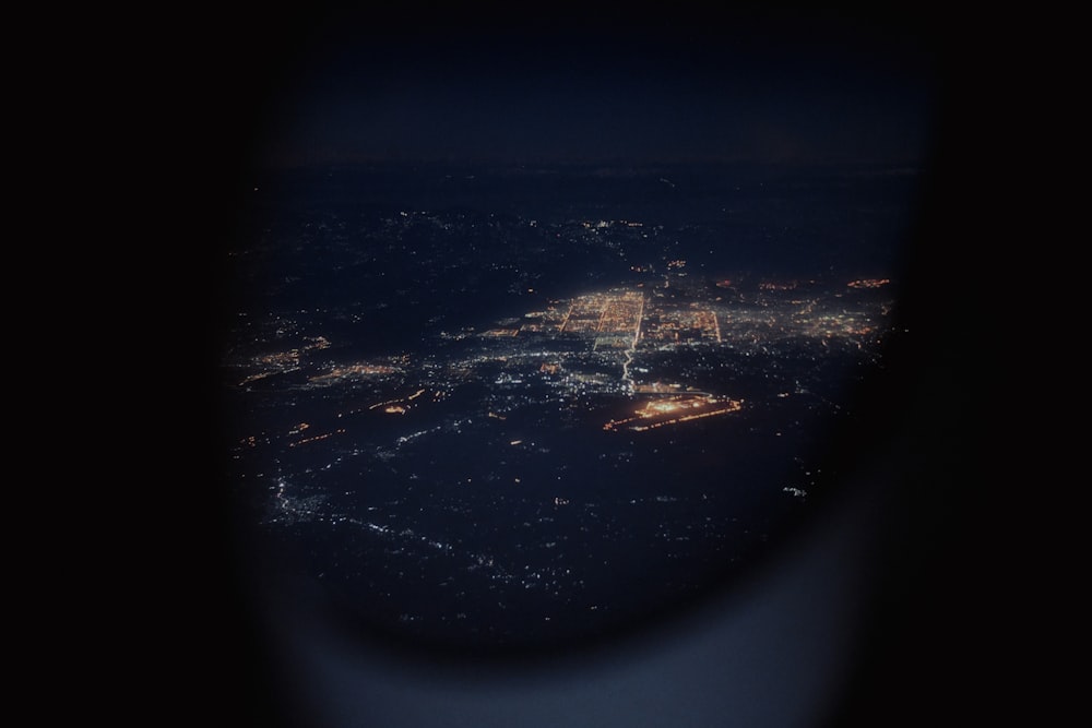 an aerial view of a city at night