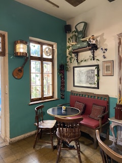 A peaceful corner with light colors and musical notes painted on the walls, inviting calm and healing.