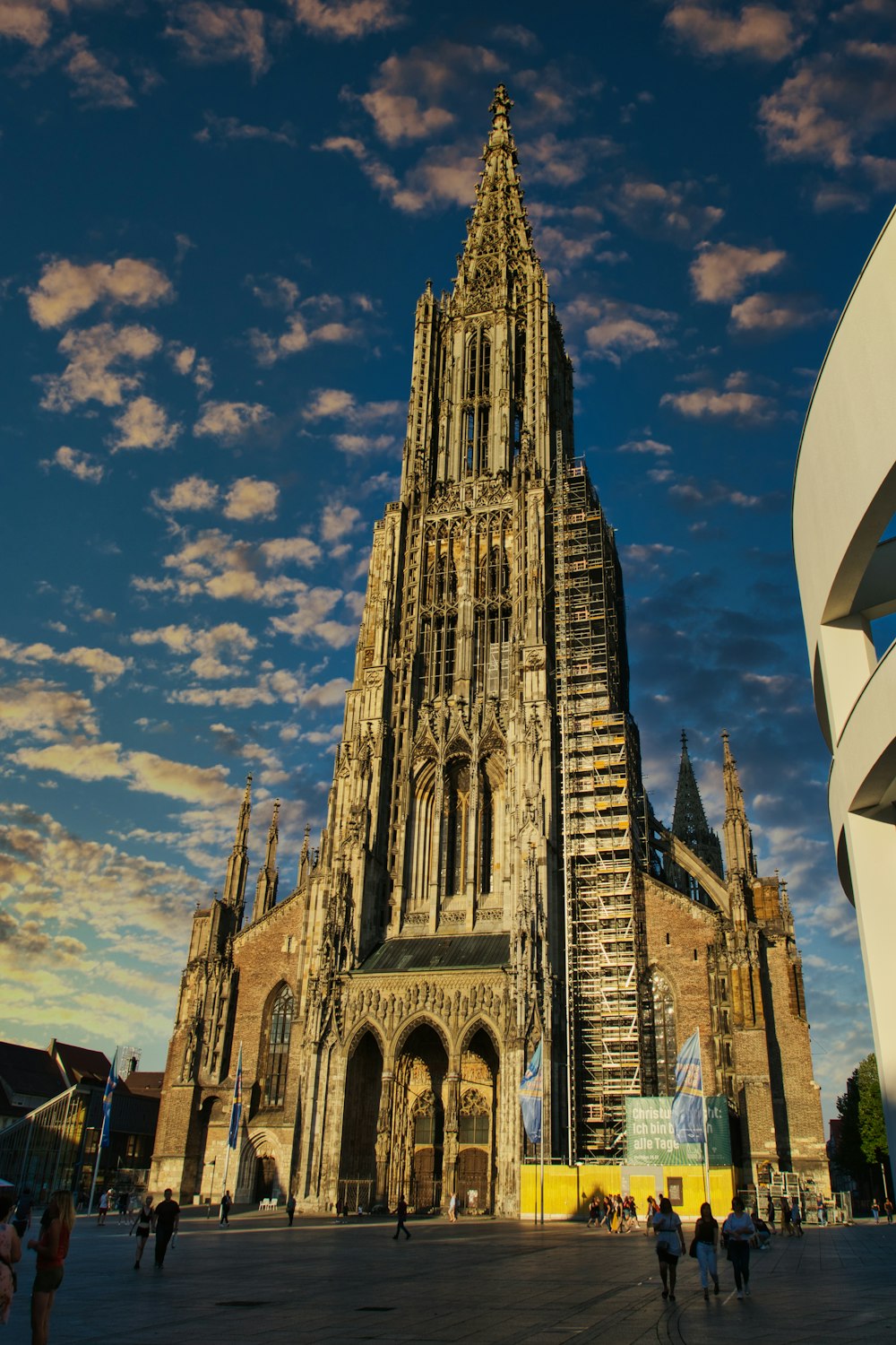 a very tall building with a sky background