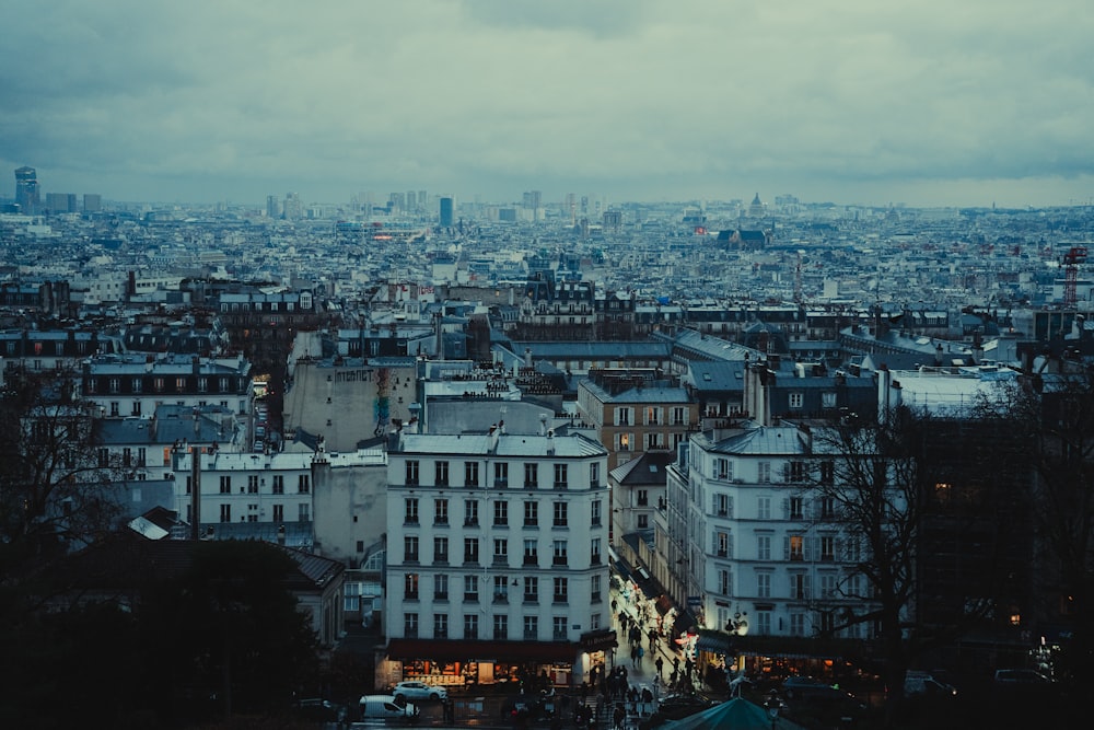 a view of a city from the top of a hill