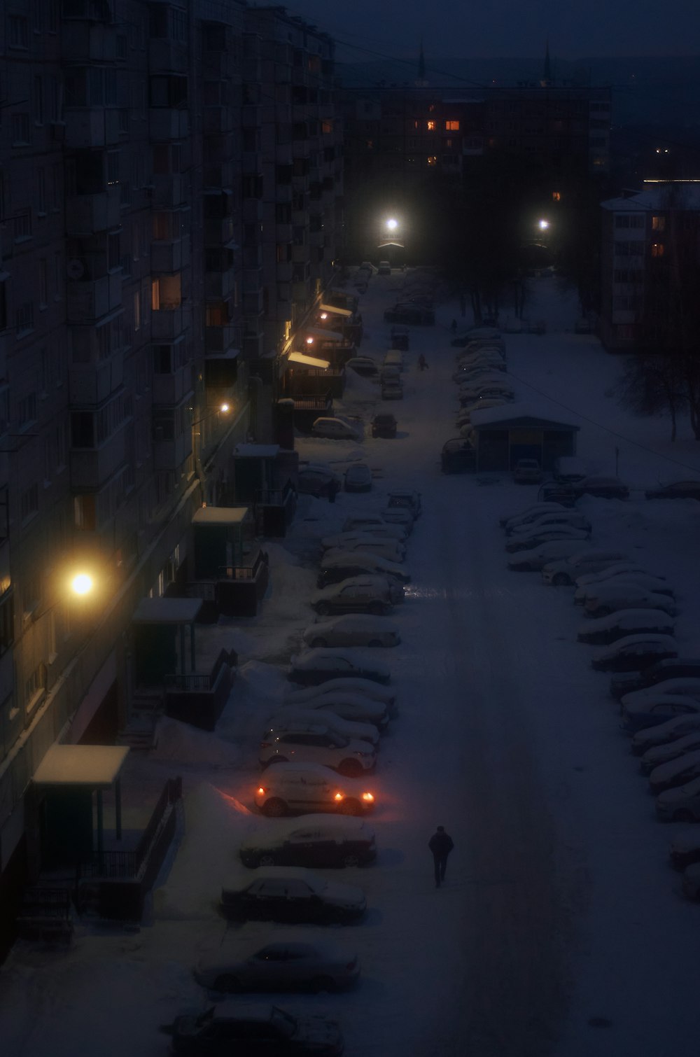 a parking lot filled with lots of parked cars