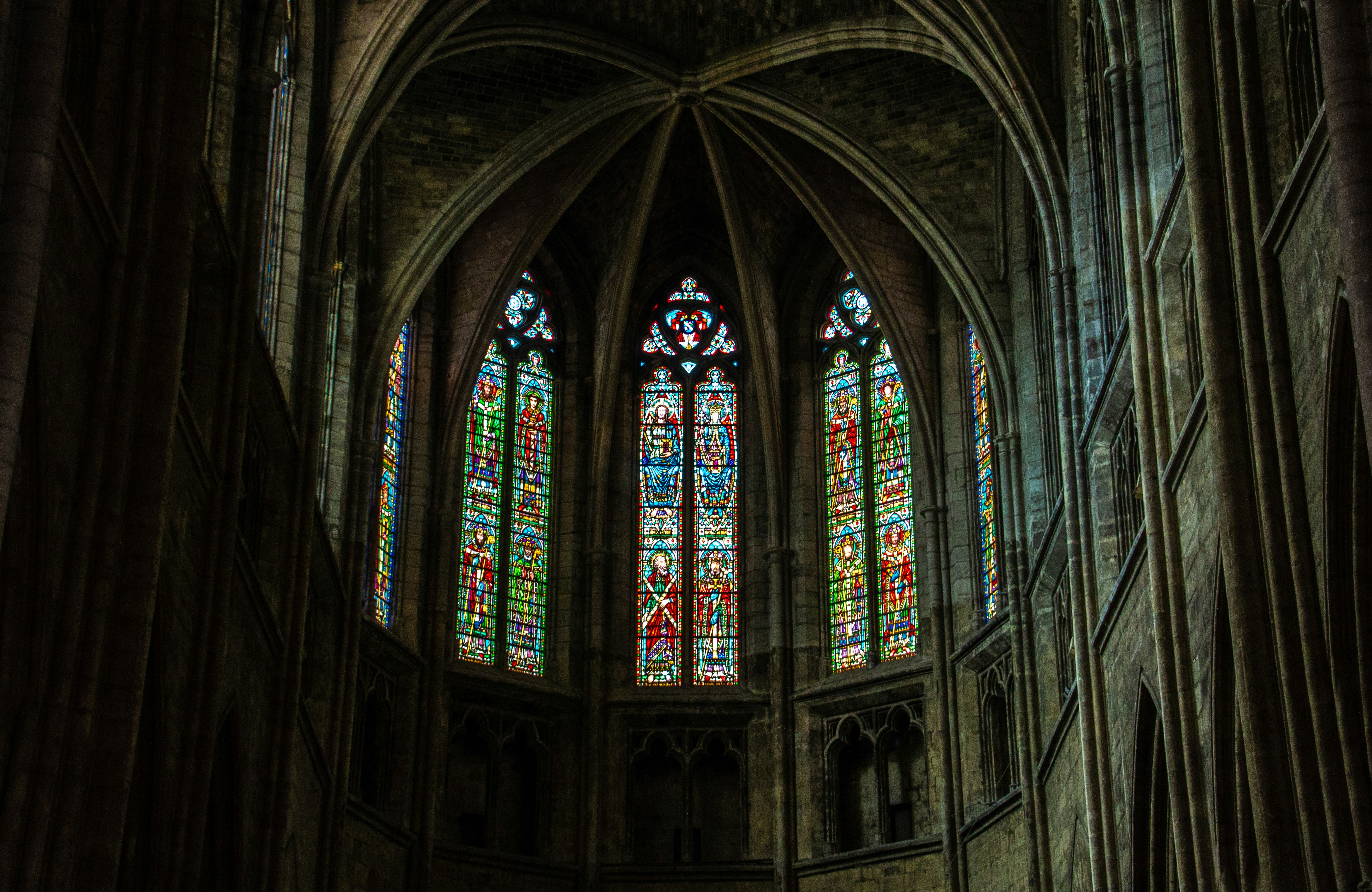 a large cathedral with a lot of stained glass windows, "Eternity"</p><p>Saint André cathedral - Bordeaux, France