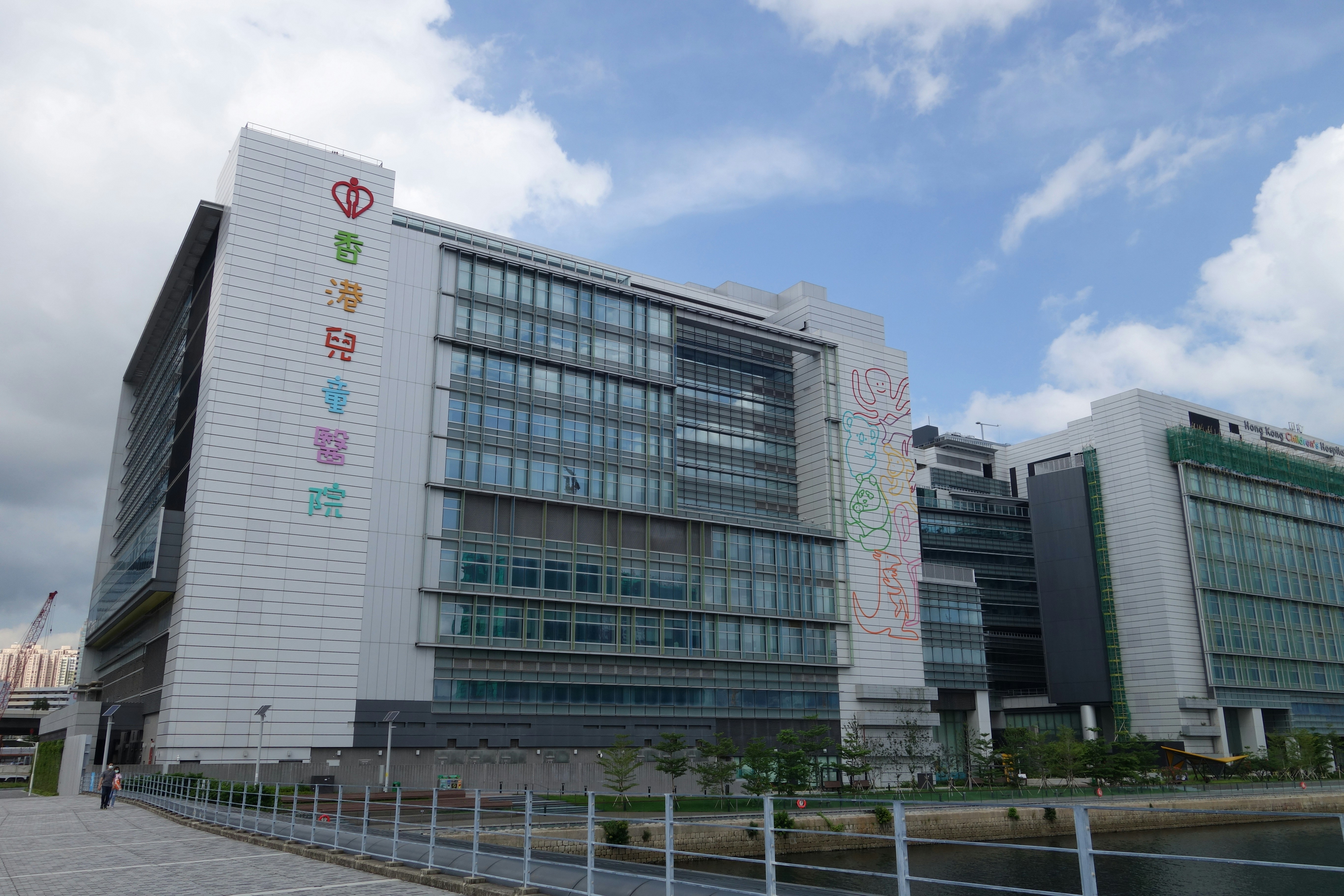 a large white building with chinese writing on it