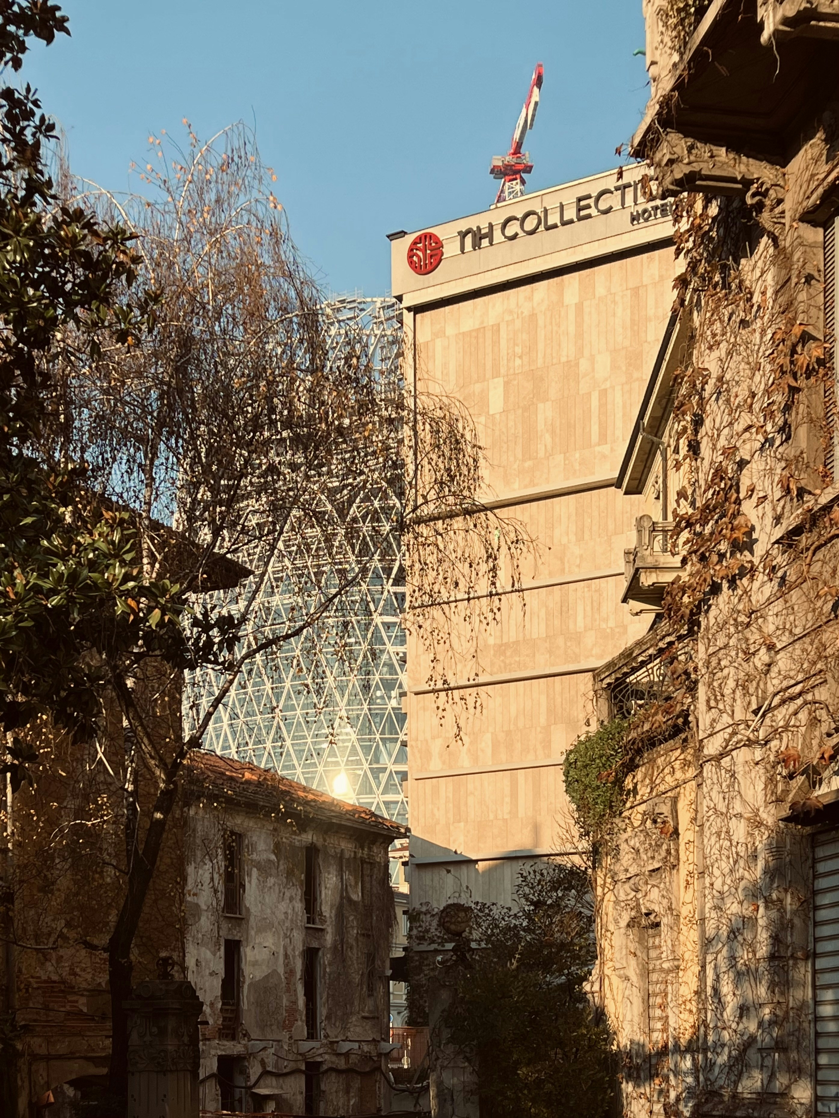 a tall building with a sign on top of it