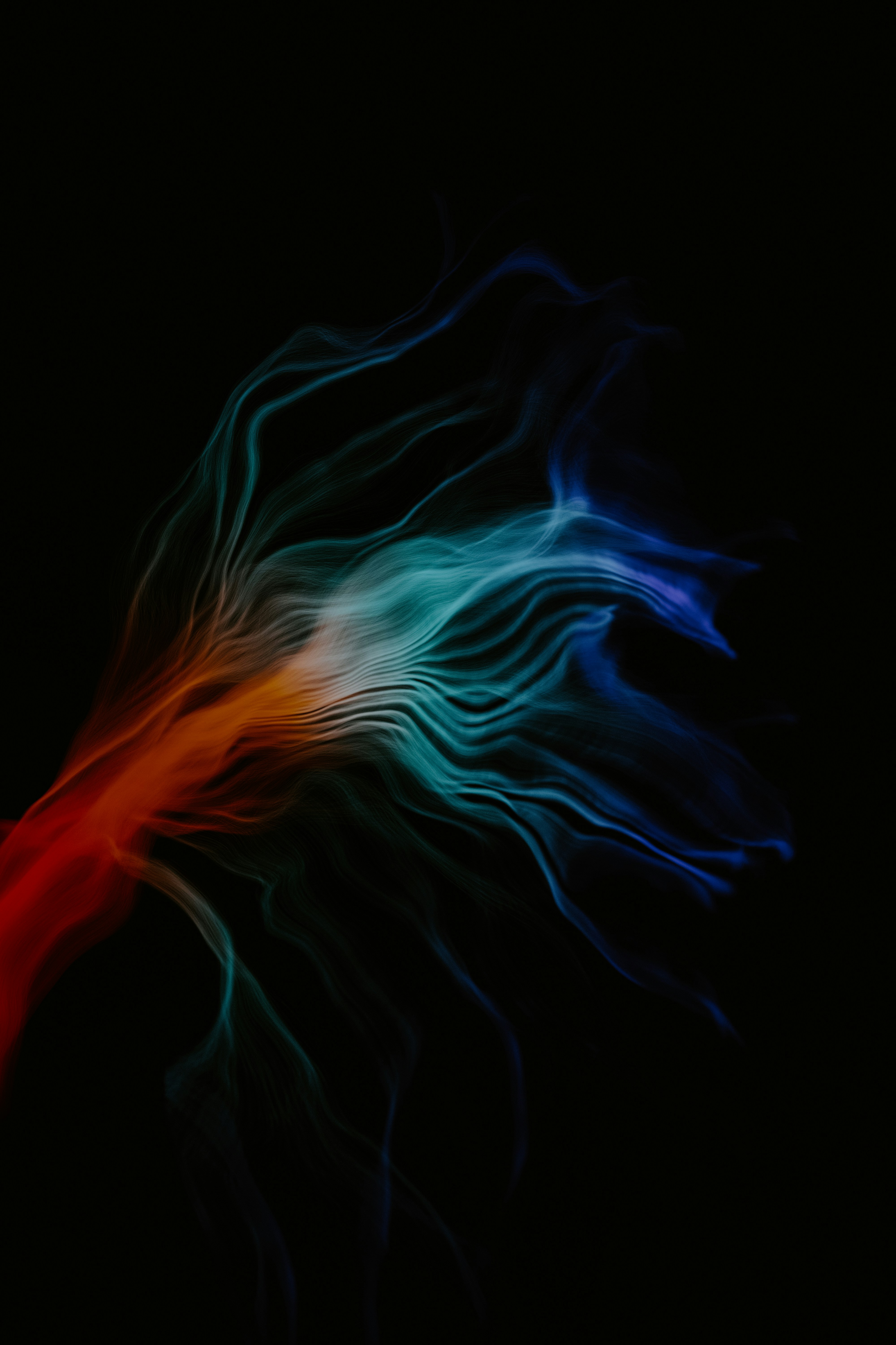 A blurry image of a red, white and blue object