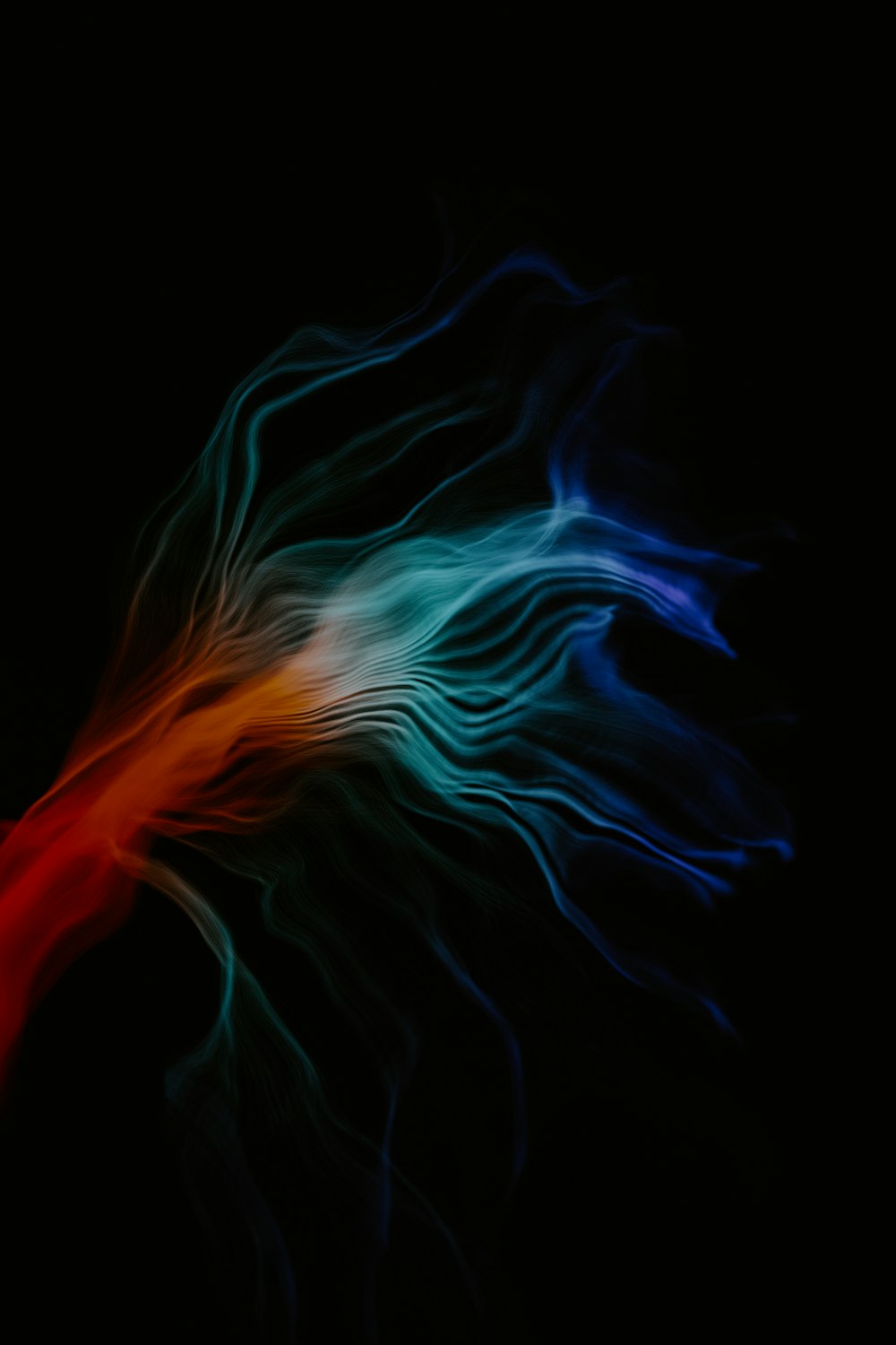 un'immagine sfocata di un oggetto rosso, bianco e blu