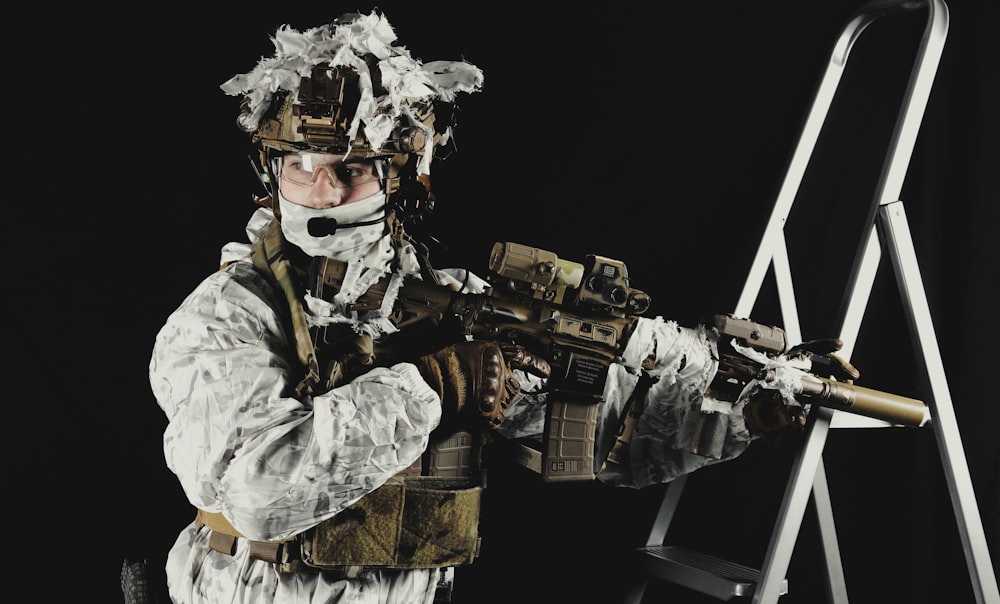 a man in a white uniform holding a gun