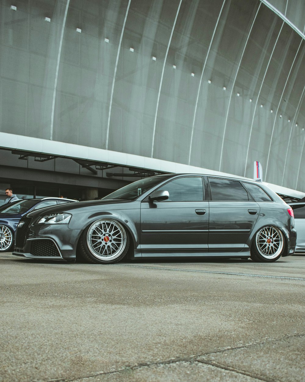 a couple of cars parked next to each other