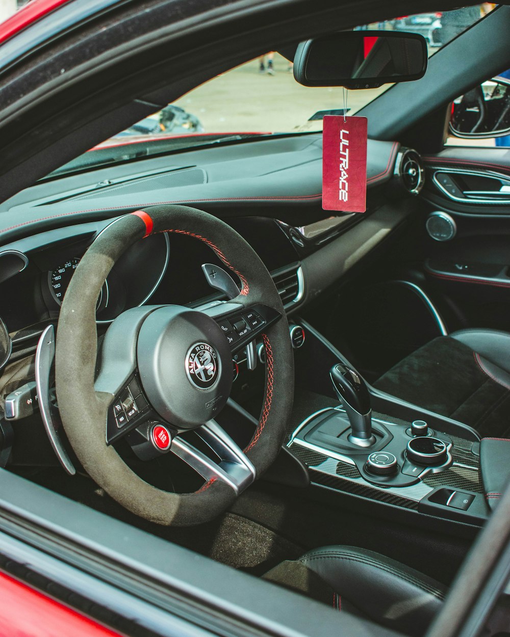 the interior of a car with a steering wheel