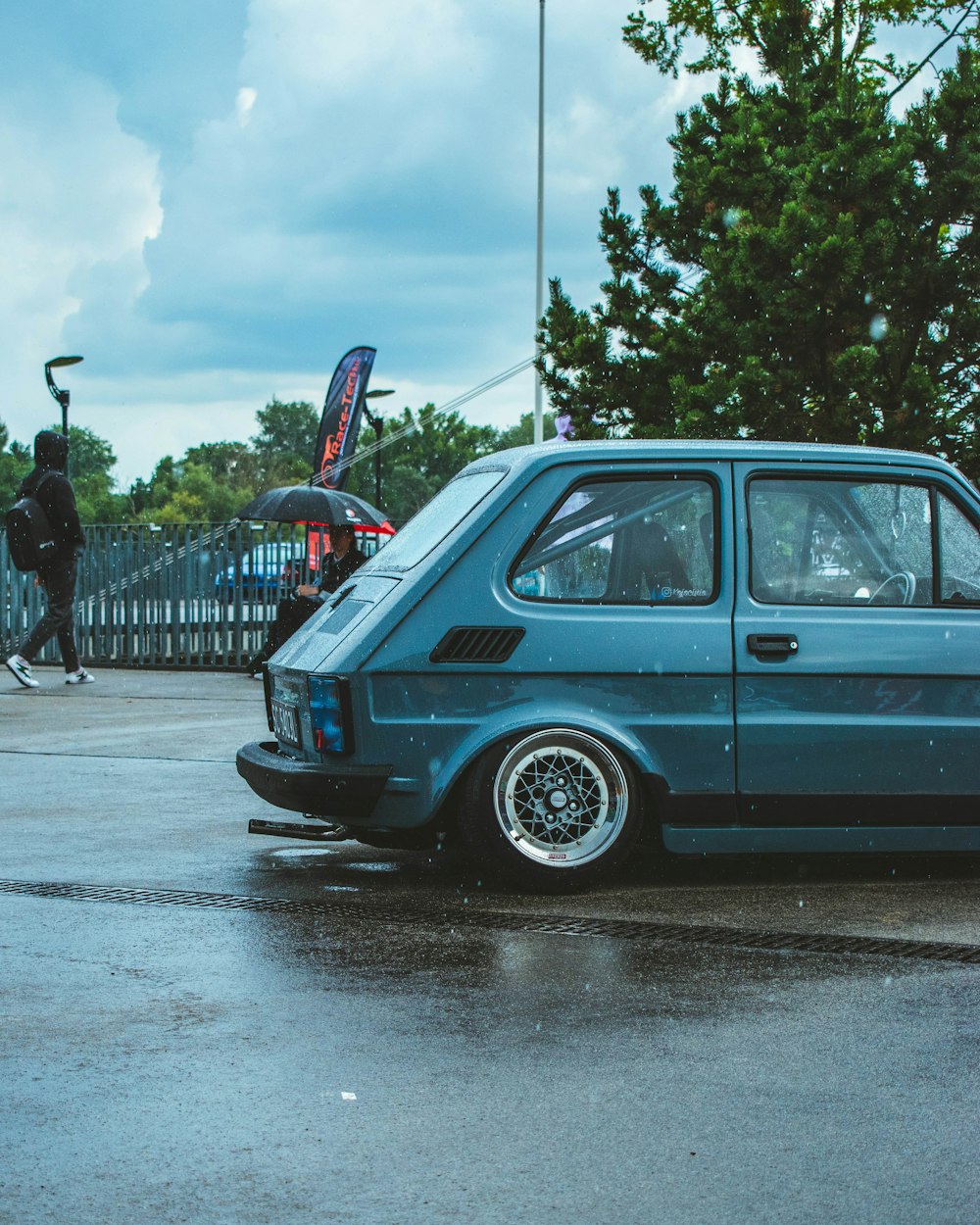 A blue sports car parked in a parking lot photo – Free California Image on  Unsplash