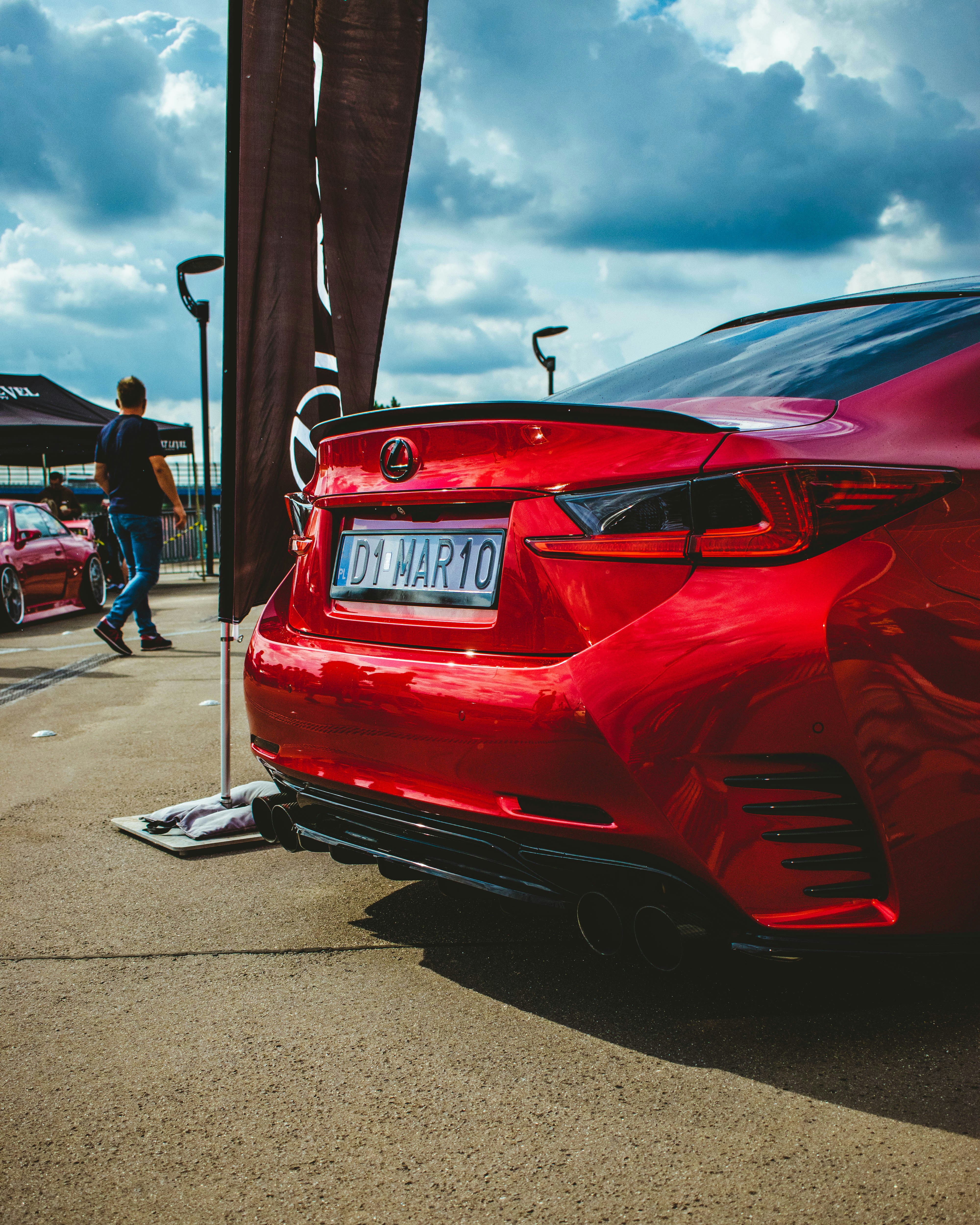 a red car parked on the side of the road