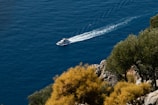a small boat is out on the water