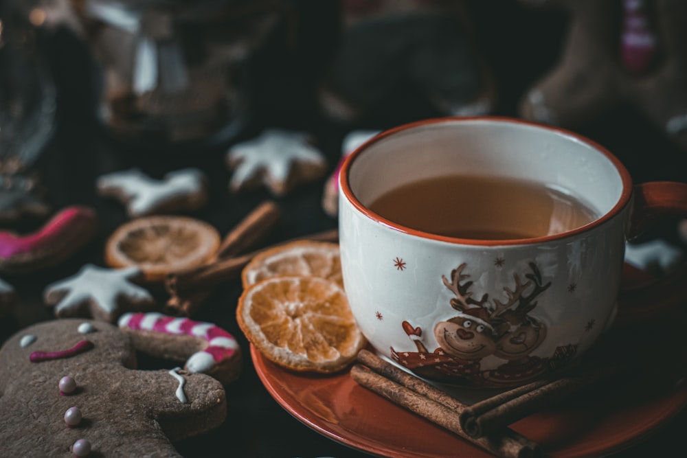 a cup of tea and some cookies on a table