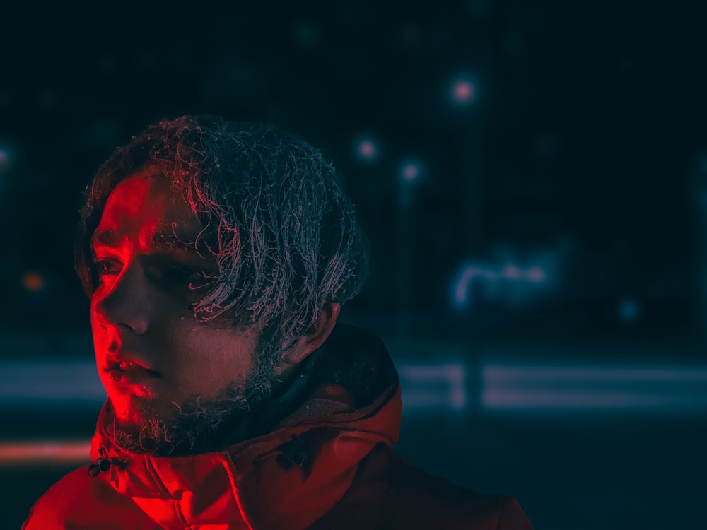 a man with a beard and a red light