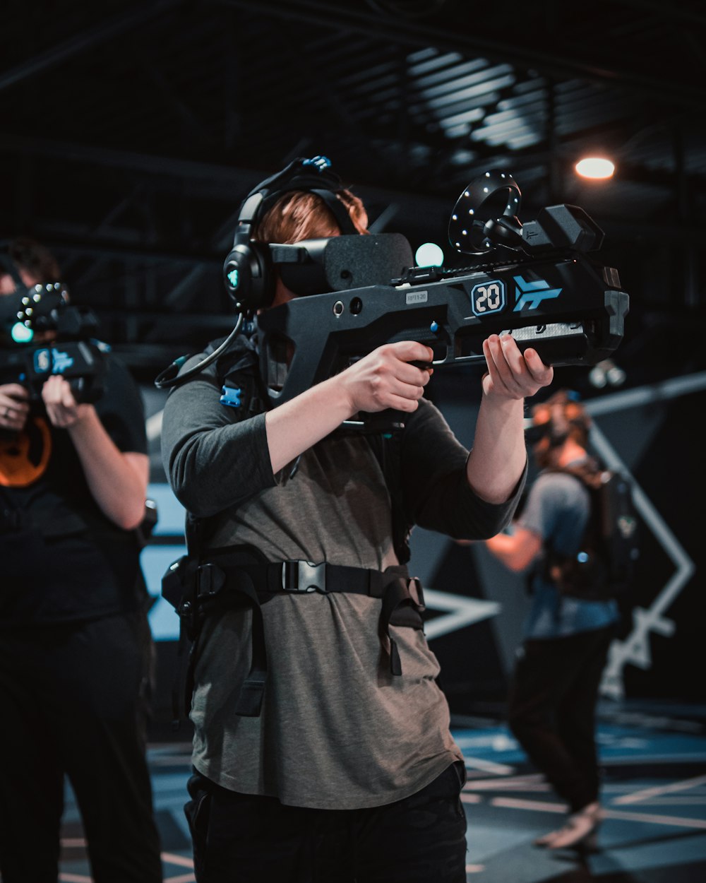 a woman holding a video camera in her hands