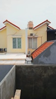 a view of a house from the roof of a building