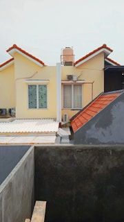 a view of a house from the roof of a building