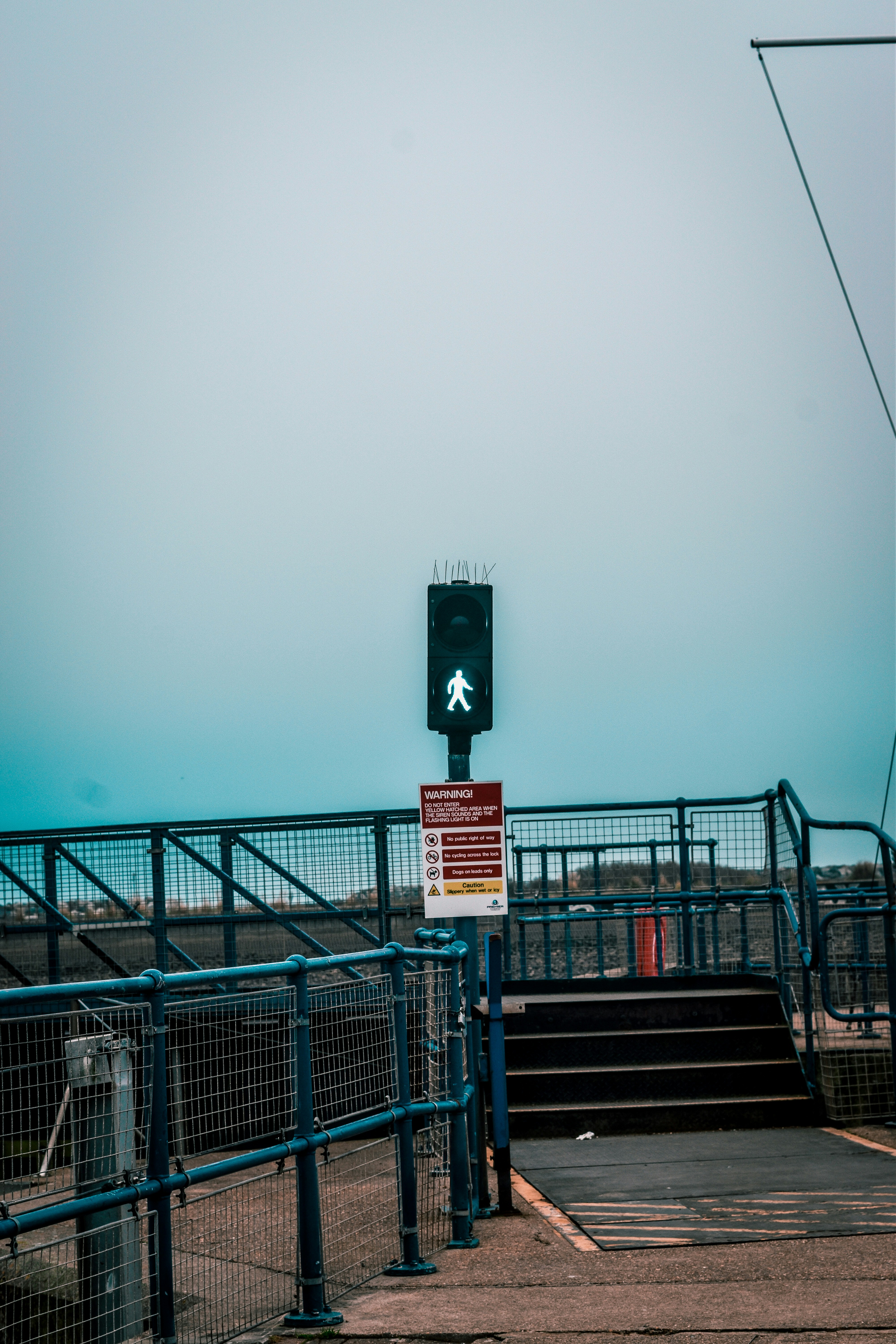A traffic light sitting on the side of a road photo Free Eastbourne