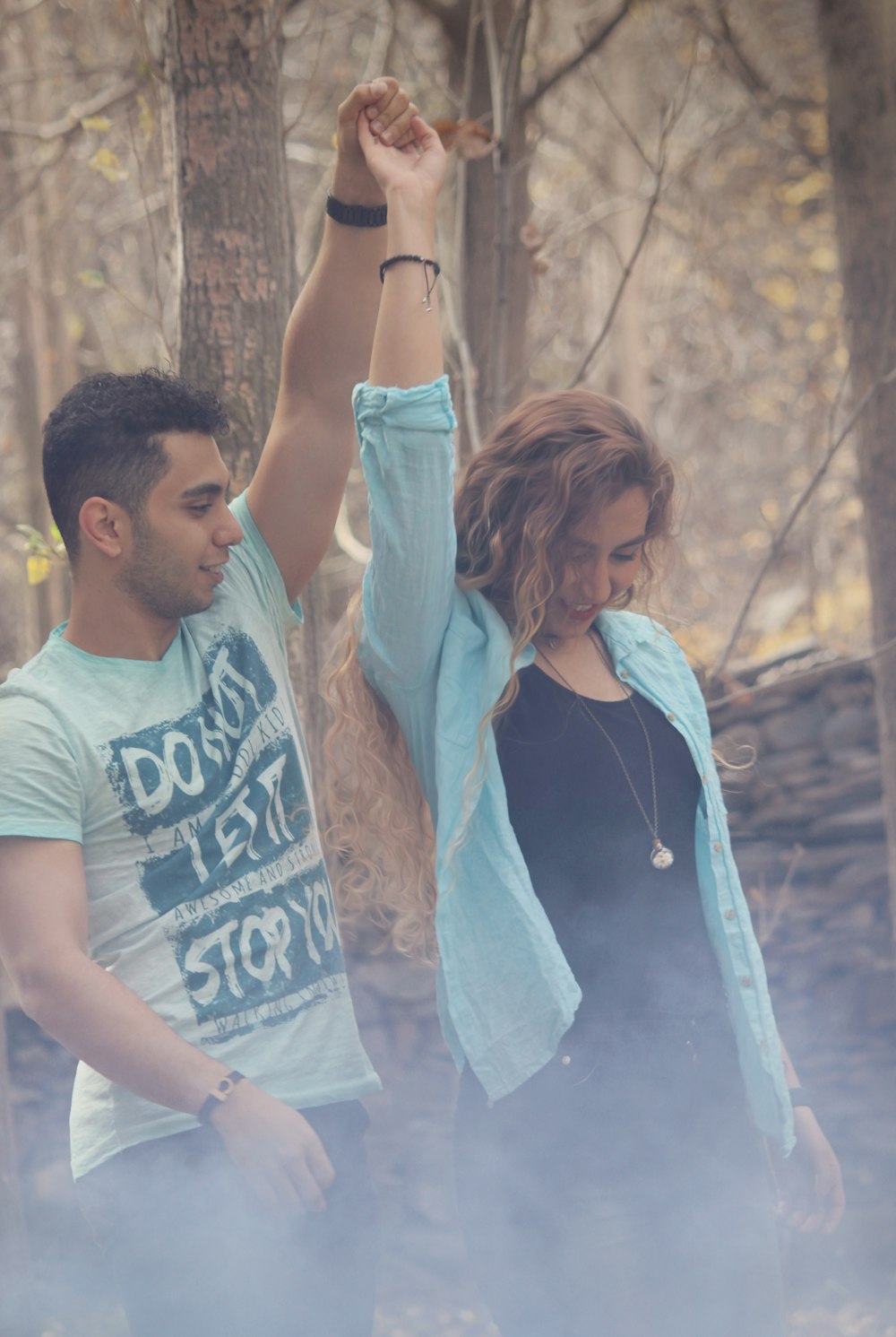 a man and a woman standing next to each other