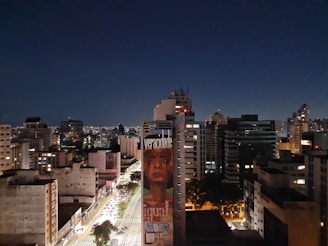 A bold cityscape wallpaper mural created from a night-time urban photo.