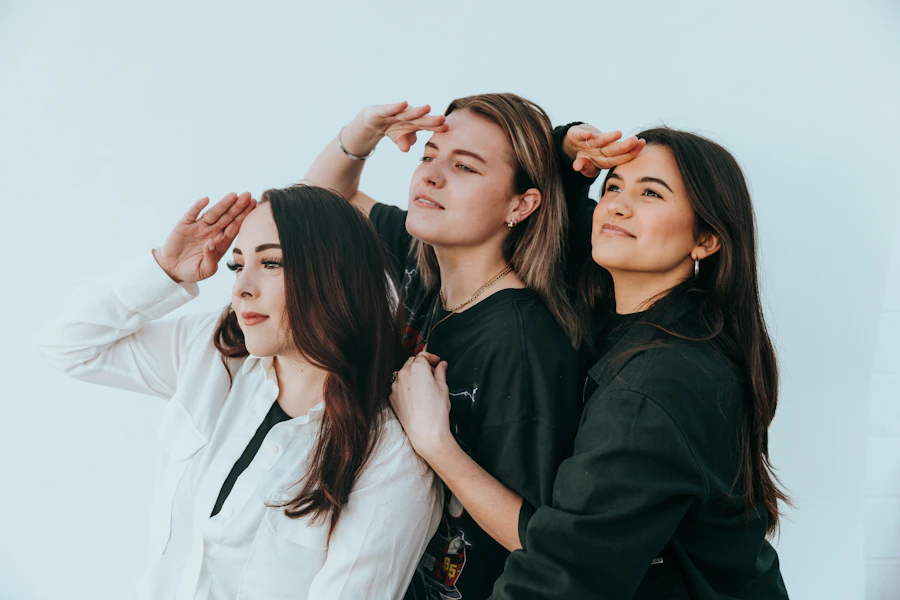 a group of women standing next to each other