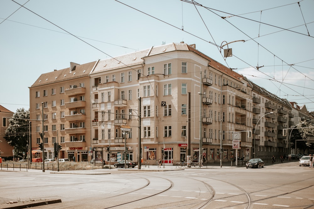 a large building sitting on the corner of a street