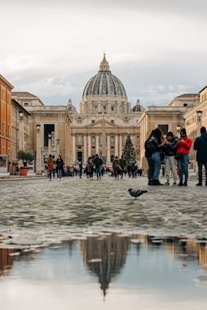 a group of people standing in front of a building