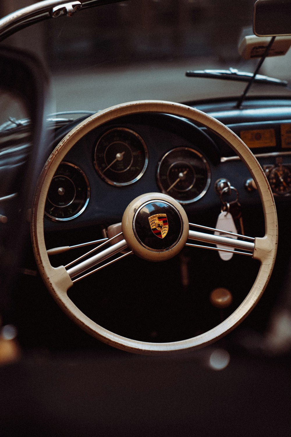 a steering wheel and dashboard of a car