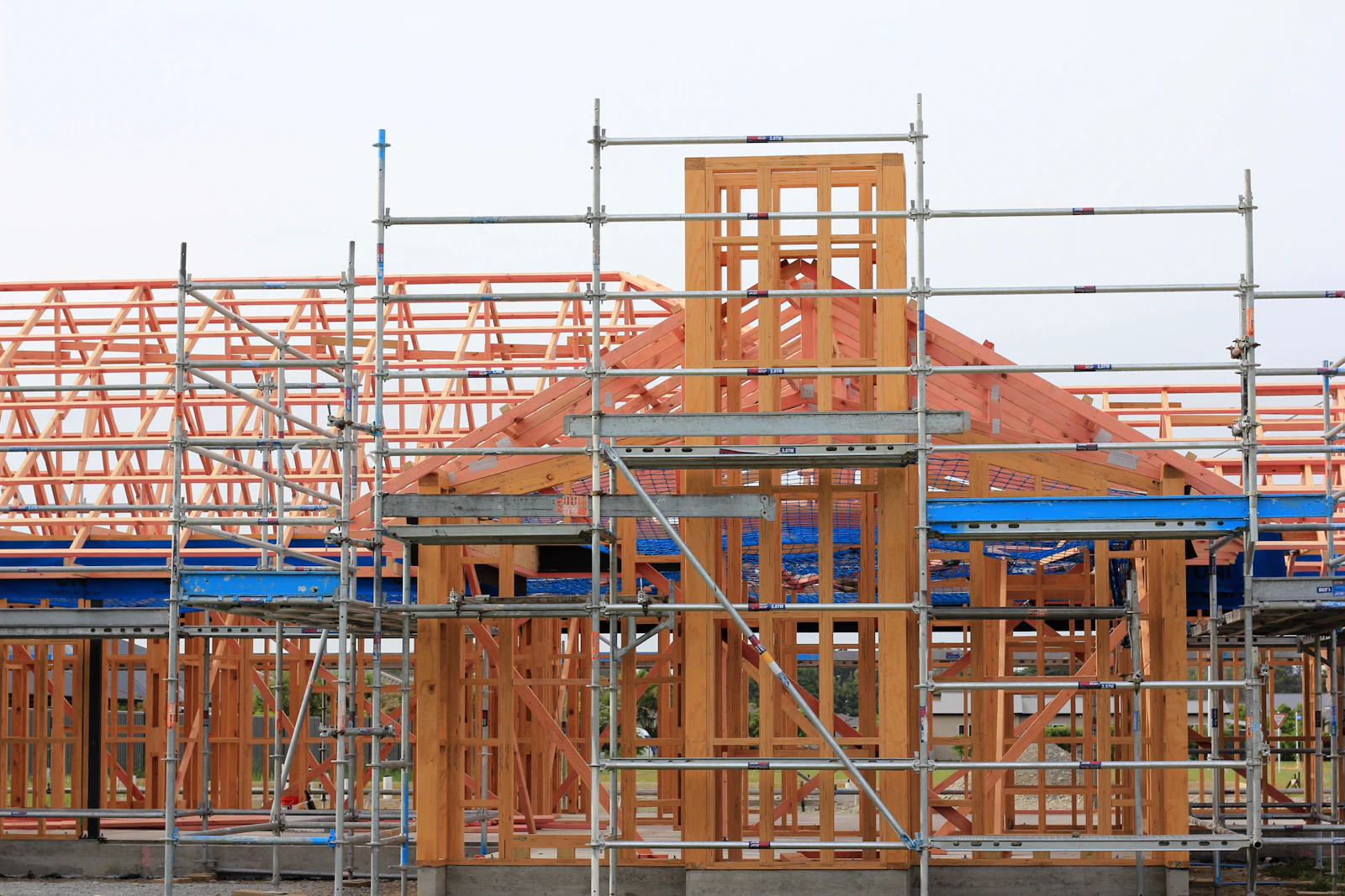 A building permanently wrapped in construction scaffolding