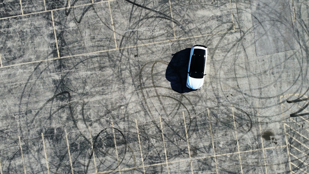 an aerial view of a car parked in a parking lot, Toyota Camry TRD