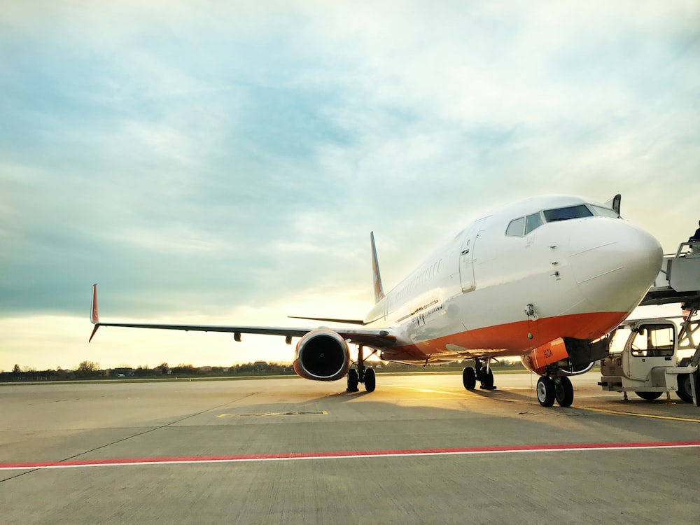 a large jetliner sitting on top of an airport tarmac