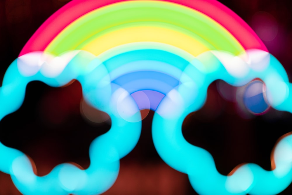 a blurry photo of a rainbow colored object