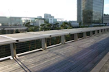 Commercial walkway lined with sleek, low-maintenance WPC boards, bustling with foot traffic.