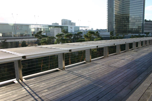 Commercial walkway lined with sleek, low-maintenance WPC boards, bustling with foot traffic.