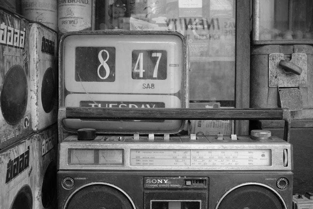 an old radio sitting on top of a table