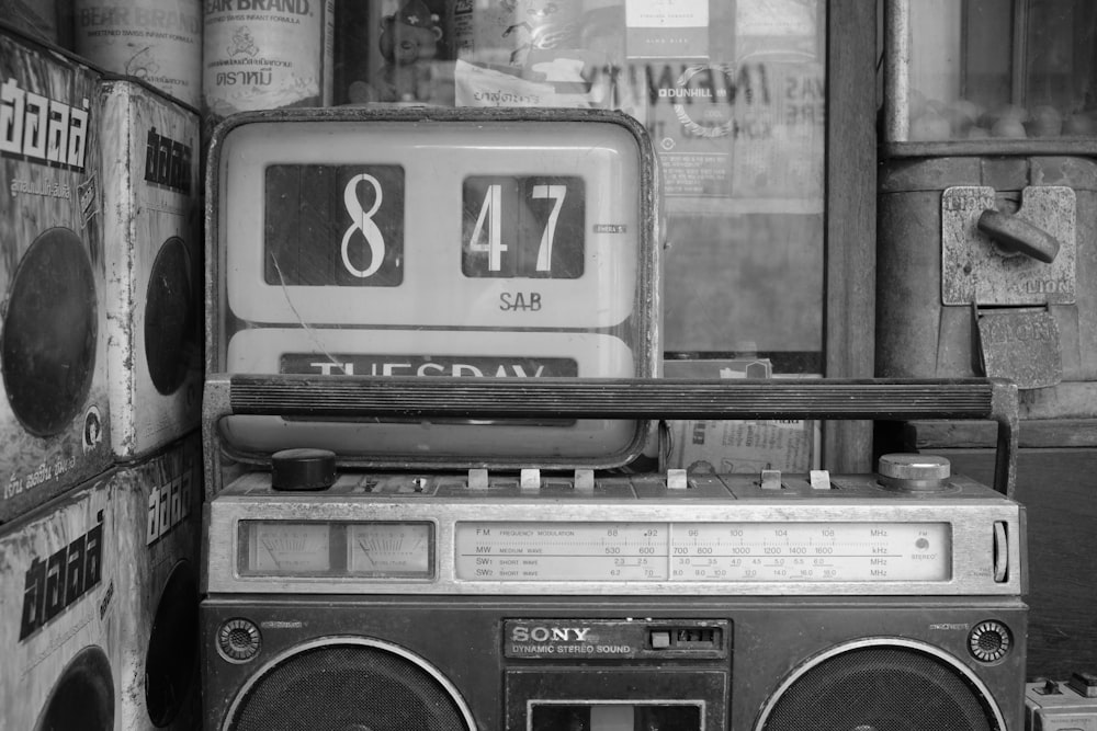 an old radio sitting on top of a table